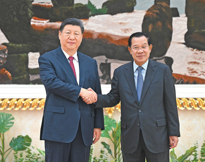 习近平会见柬埔寨人民党主席、参议院主席洪森